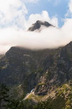 Tatra mountains, peak in the clouds. Stock Photos
