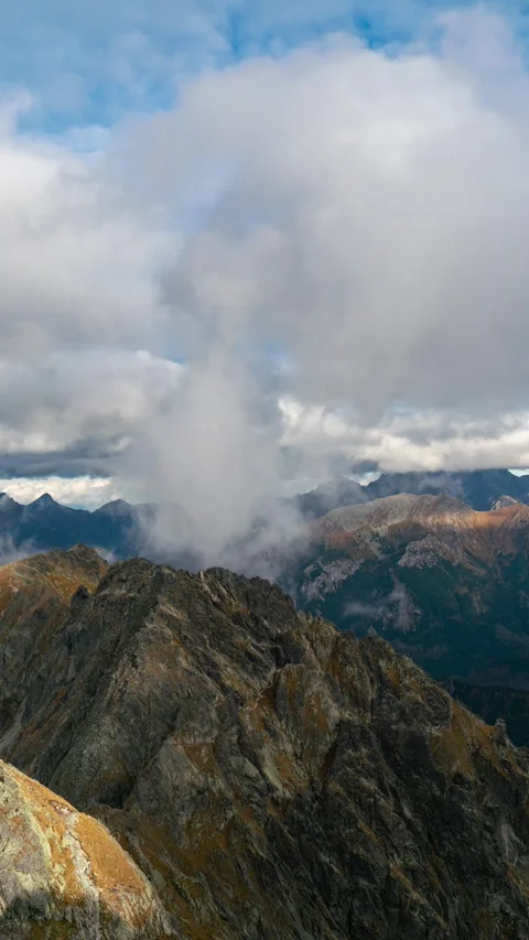 Tatra Topography: Clouds Dance Over Rugged Peaks Video stock 309656643