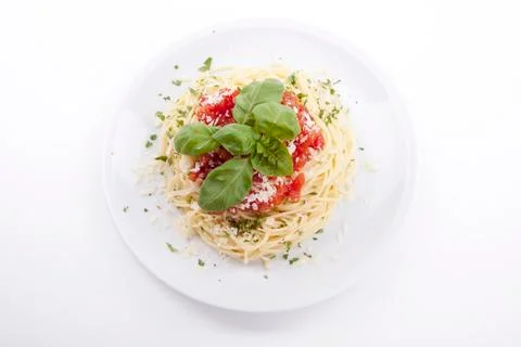 Tatsty fresh spaghetti with tomato sauce and parmesan isolated Stock Photos