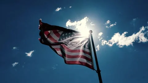 Tattered American Flag Blowing in the Wind  Stock Footage 285874252