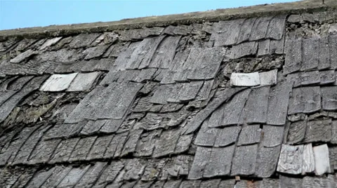 The tattered cedar wooden shingle roof is about to cause some problems Video stock 32241553