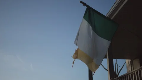 Tattered Irish flag waves in the wind Stock Footage 124327959
