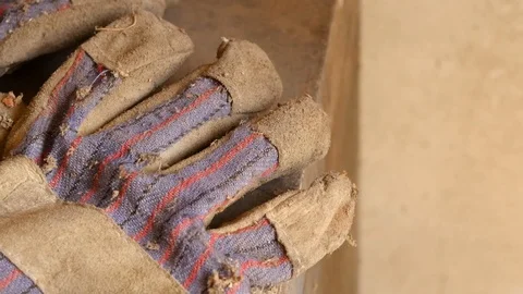 Tattered work gloves Stock Footage 88918672