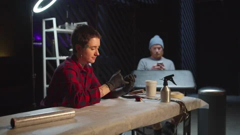 Tattoo artist prepares tools for the session Stock Footage 131065798