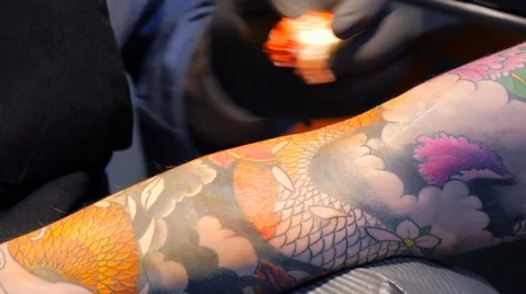 Tattoo artist at work Stock Footage 42010530