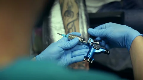 Tattoo artist working. Stock Footage 39674746