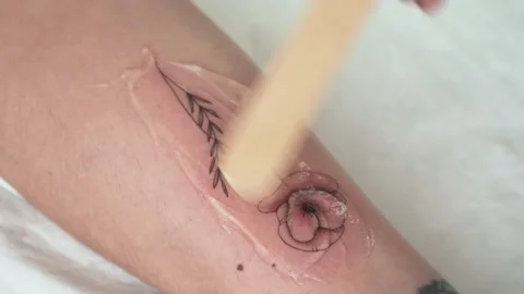 Tattoo creation process and maintenance, real time 動画素材 182542404