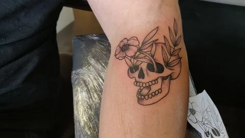 Tattoo getting moisterized with Vasline Stock Footage 107365992