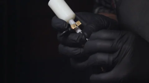 Tattoo Gun adjustment Stock Footage 28297557