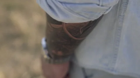 Tattoo on guy hand close up Stock Footage 145986070