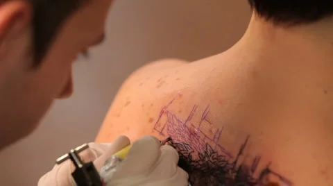 The tattoo on his back Stock Footage 974208