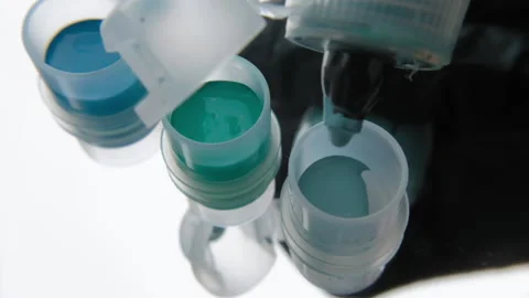 Tattoo ink in small jars Stock Footage 195961670