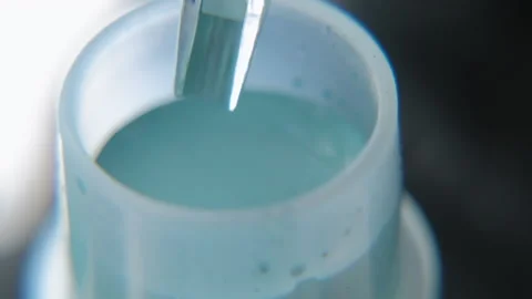 Tattoo ink in small jars Stock Footage 195962273