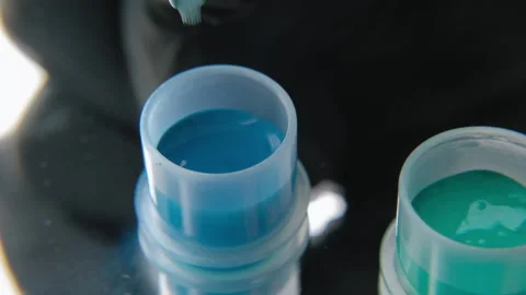 Tattoo ink in small jars Stock Footage 195962497