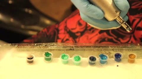 Tattoo machine ink dip Stock Footage 5299340