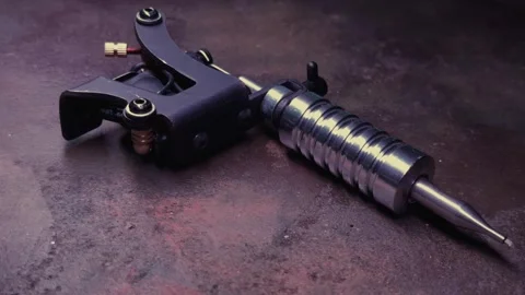 Tattoo Machine on a Table Stock Footage 304299731