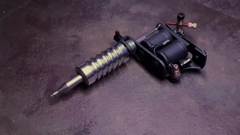 Tattoo Machine on a Table Stock Footage 304299870