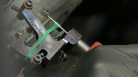 Tattoo machine at work, close up, 4k Stock Footage 63301848