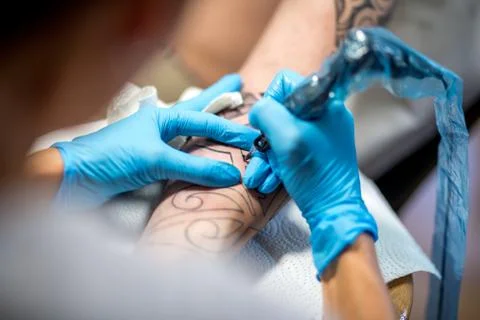 Tattoo making in studio Stock Photos