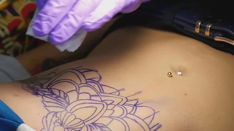 Tattoo master makes the tattoo close-up Stock-Footage 73138716