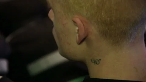 Tattoo on the neck of a convict Video stock 37870903