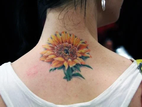 Tattoo on neck Stock Photos