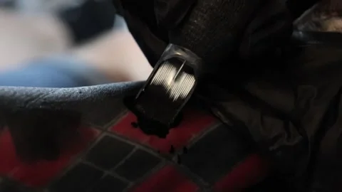 Tattoo needle applying black ink on arm. Macro view Stock Footage 306848369