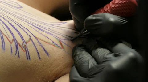 Tattoo outlining, 4k Stock Footage 63301969