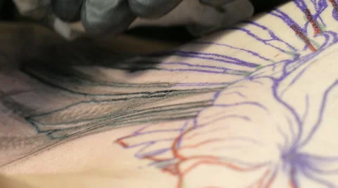 Tattoo process close up, 4k Stock Footage 63302095