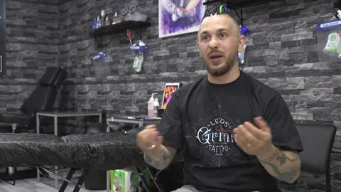 Tattoo studios re-open in England after lockdown Stock Footage 148574564