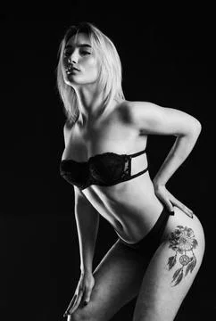 Tattooed and gorgeous. Girl wear bra. Sensual model in lingerie black  background Stock Photo #232514160