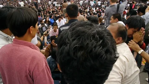 Tattooed devotees at Wat Bang Phra enter a violent trance. Stock Footage 121085393
