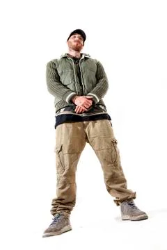 Tattooed rap singer posing in studio on a white background Stock-Fotos