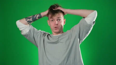 Tattooed surprised man looking at camera 库存影片 209133005