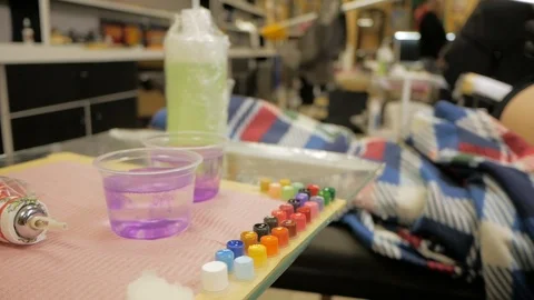 Tattooer at work in studio Stock Footage 88377665