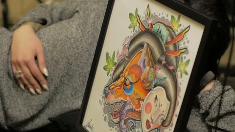 Tattooer at work in studio Stock Footage 88377770