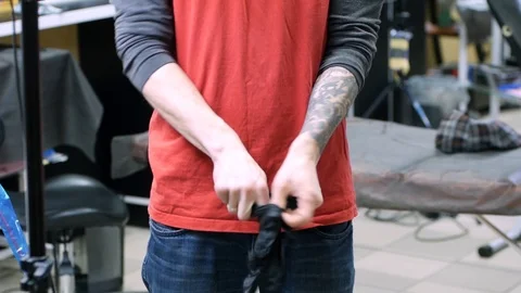 Tattooer at work in studio Stock Footage 88378037