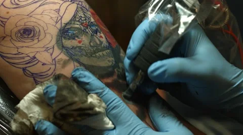 Tattooer Working on a New Tattoo Stock Footage 54477652