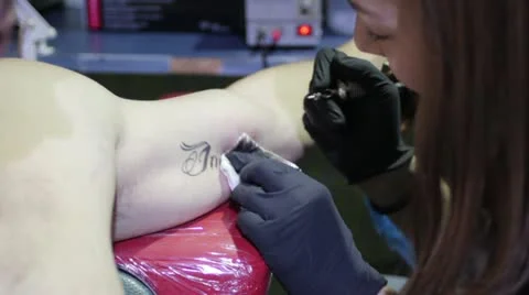 Tattooing _1 Stock Footage 12735906