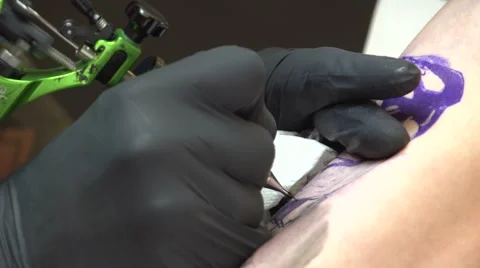 Tattooing on a arm Stockbeeldmateriaal 50582280