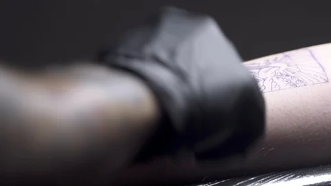 Tattooing an arm. Stock Footage 129026025