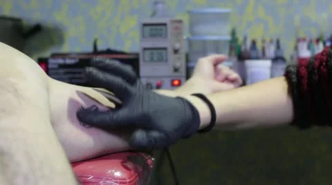 Tattooing (cleaning) Stock Footage 12731311