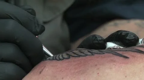 Tattooing - close up - uper left shoulder - dragon Video stock 10604932