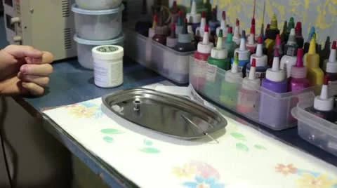Tattooing ink bottles Stock Footage 12735872
