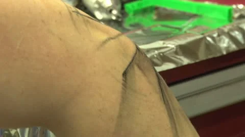 Tattooing spider web on elbow Video stock 10604912