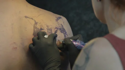 Tattooist making of tattoo Stock Footage 39557966