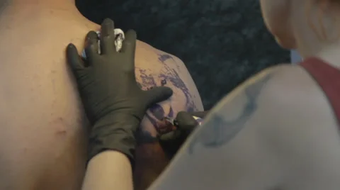 Tattooist making of tattoo Stock Footage 39558035
