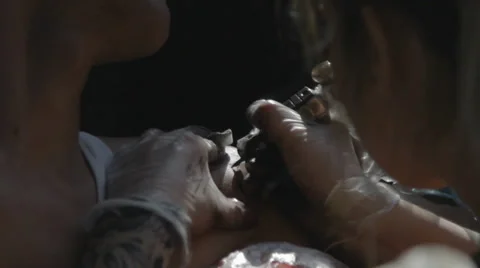 Tattooist making of tattoo Stock Footage 39558183