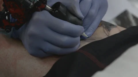 Tattooist making of tattoo Stock Footage 39558200