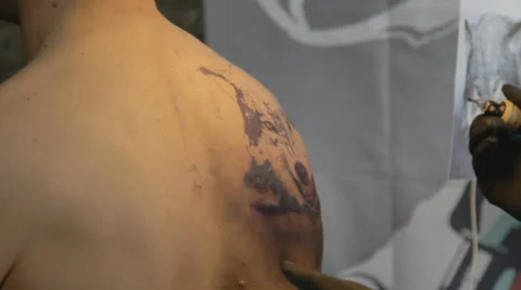 Tattooist making of tattoo Stock Footage 39558290